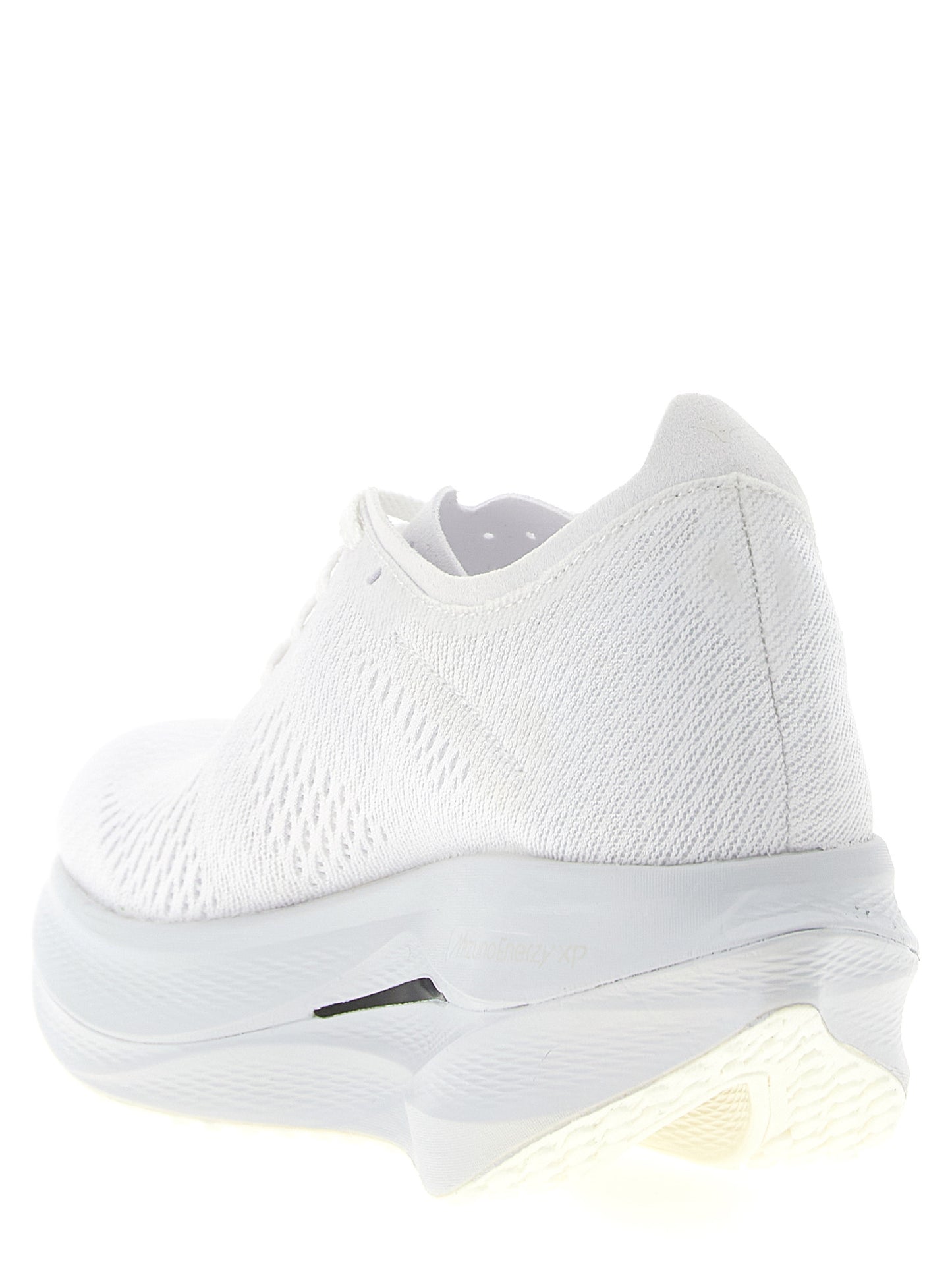 Athletic Sneakers by Comme Des Garçons for women in synthetic fabric white presents a sleek silhouette, perfectly capturing the athletic style essence of Women's Athletic Synthetic Fabric Sneakers with its sleek design and premium finish.