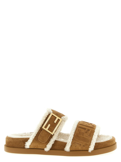 Sliders Sandals Flat Shoes by Fendi for women in suede calfskin leather & fur beige & patterned features an statuesque silhouette from the Women's Suede Calfskin Leather & Fur Sliders Sandals Flat Shoes collection, showcasing a and a statuesque for a statuesque look.