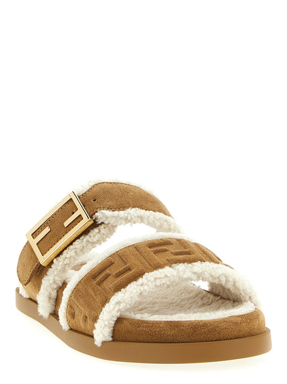 Sliders Sandals Flat Shoes by Fendi for women in suede calfskin leather & fur beige & patterned showcases a resplendent Women's Suede Calfskin Leather & Fur Sliders Sandals Flat Shoes aesthetic with a and .