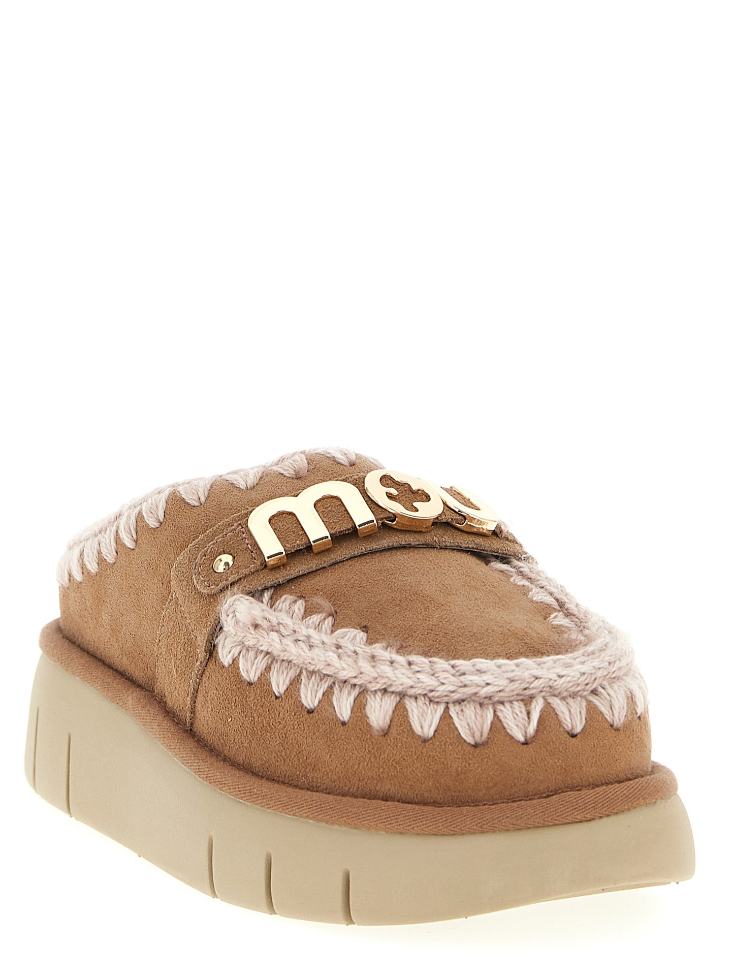 Clogs Flat Shoes by Mou for women in suede lambskin leather & fur multicolor presents a effortless chic silhouette, showcasing the Women's Suede Lambskin Leather & Fur Clogs Flat Shoes design with a effortless chic and for a sophisticated look.