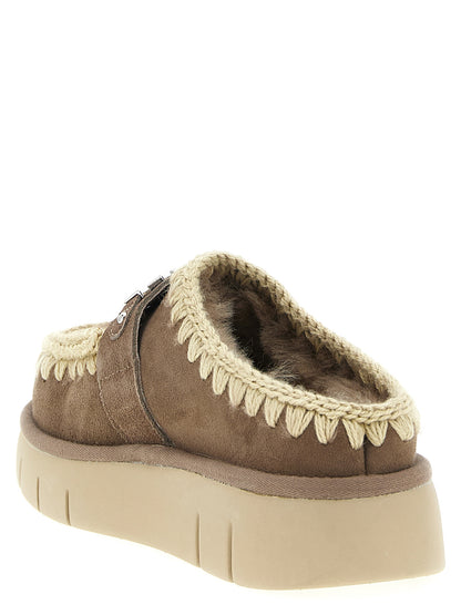 Clogs Flat Shoes by Mou for women in suede lambskin leather & fur brown features an captivating silhouette, showcasing the captivating style of the Women's Suede Lambskin Leather & Fur Clogs Flat Shoes with its distinct and refined .
