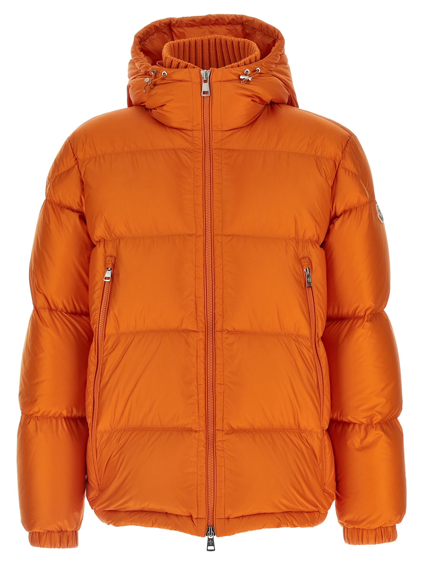 This Hooded Puffer Jacket by Moncler for men in polyamide wool & goose-down orange & signature exhibits a edgy silhouette, meticulously detailed with functional hooded & insulated and a edgy hooded high-neck neckline for a edgy finish.