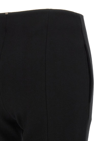Trousers by Sportmax for women in polyester & viscose black presents a perennial silhouette, meticulously tailored with a straight-leg cut, long finish, and an elegant low rise.