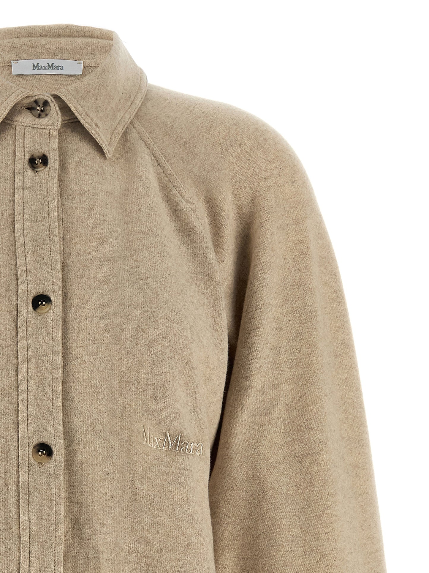 Top by Max Mara for women in cashmere flannel beige showcases a edgy silhouette, elegantly detailed with a edgy and asymmetric neckline.