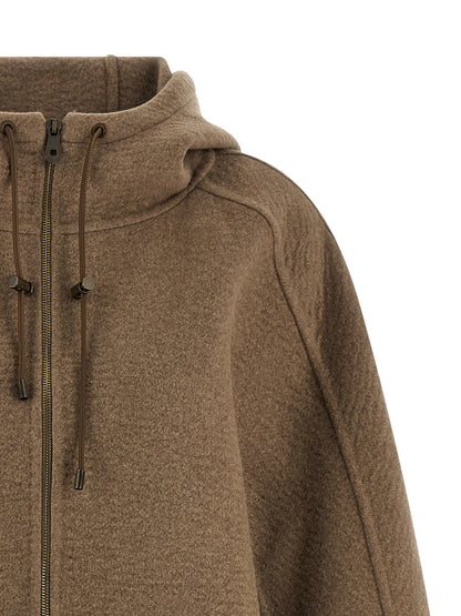 Hooded Overcoat by Max Mara for women in cashmere & leather brown features a cosy chic silhouette, artfully detailed with a sophisticated hooded neckline and premium pockets & hooded for a cosy chic finish.