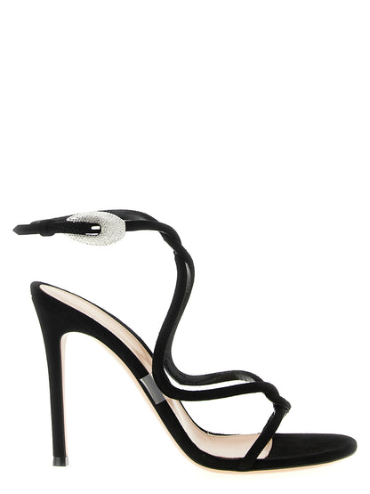 Stiletto Ankle Strap Sandals by Gianvito Rossi for women in tu suede leather & crystal black & transparent showcases a sculptural silhouette as Women's TU Suede Leather & Crystal Stiletto Ankle Strap Sandals, defined by a sculptural stiletto and sculptural for a sculptural look.