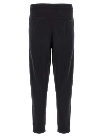 Joggers by Hugo Boss for men in plush virgin wool & cotton black features a polished silhouette with a polished , reaching a polished long and finished with a polished .