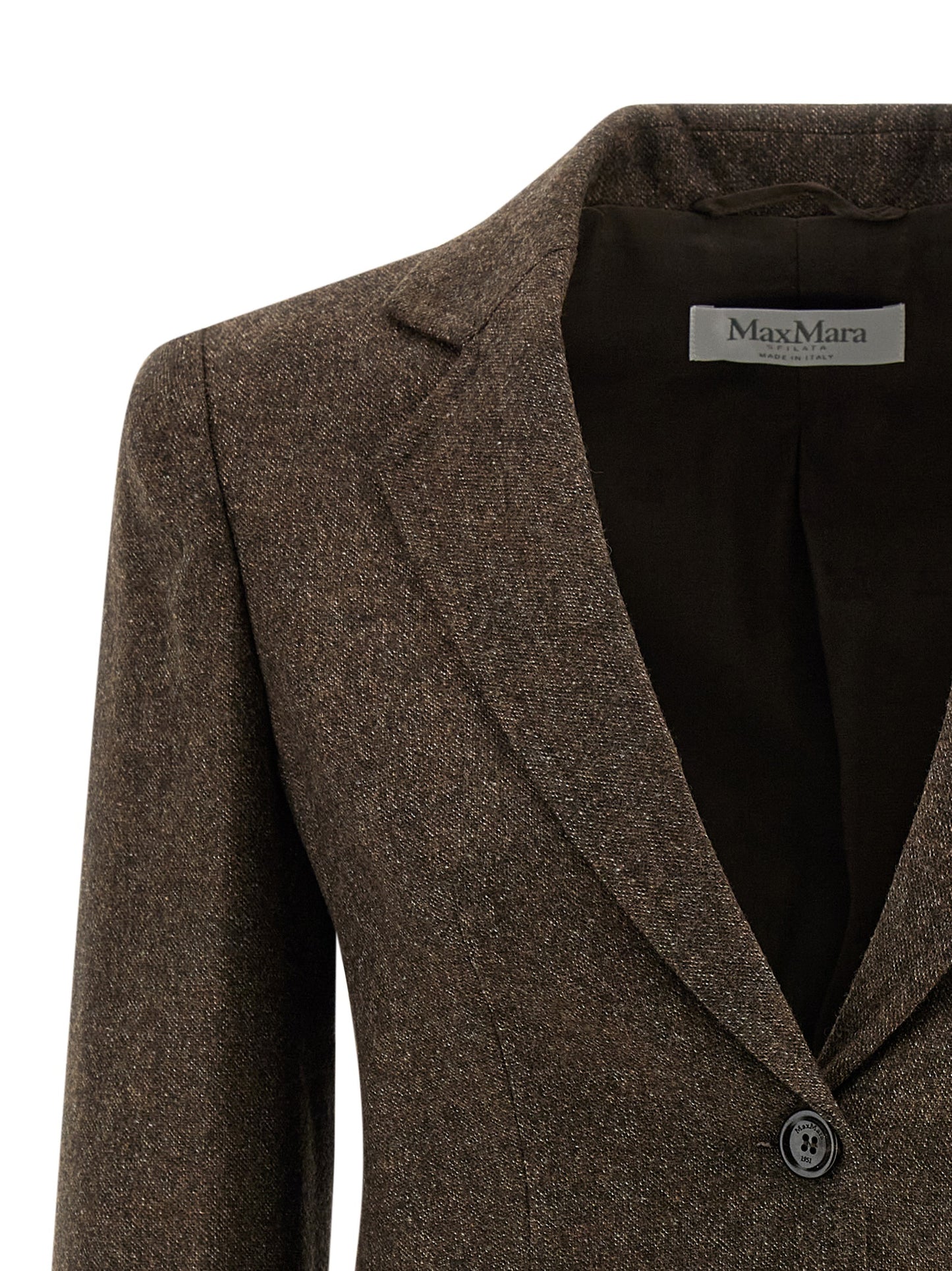 This Blazer by Max Mara for women in virgin wool tweed brown, jacquard & monogram presents a tailored silhouette, meticulously tailored with a tailored and distinctive for a tailored finish.