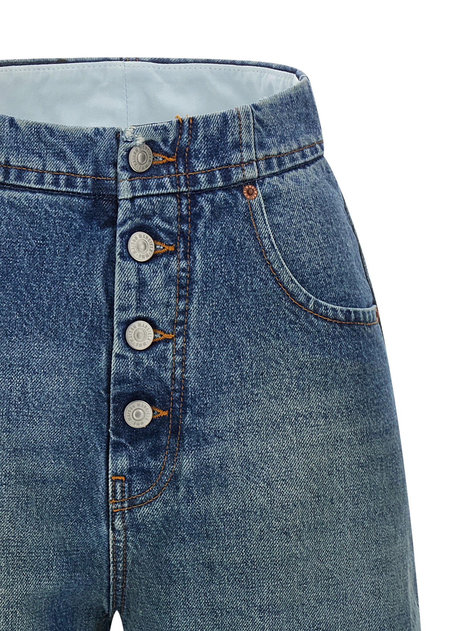 Jeans by MM6 Maison Margiela for women in denim cotton light-blue, white & signature presents a refined pantology silhouette, artfully defined by a refined pantology straight-leg, long, and a sophisticated high rise.