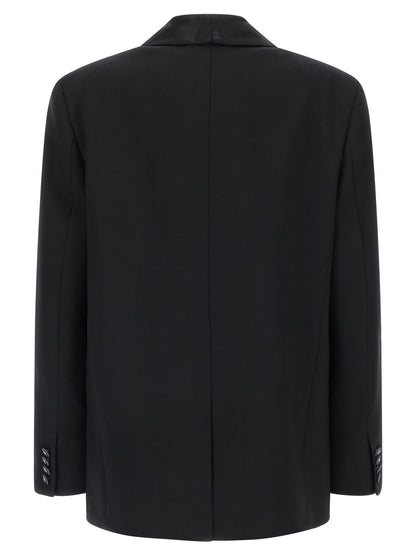 This Blazer by Emilio Pucci for women in virgin wool black & print presents a tailored silhouette, meticulously tailored with a tailored split shawl-collar neckline and distinctive for a tailored finish.