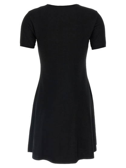 Dress by Valentino Garavani for women in polyester & viscose black features an eye catching silhouette with a sophisticated v-neck neckline, elegant , and a refined short mini for a eye catching aesthetic.