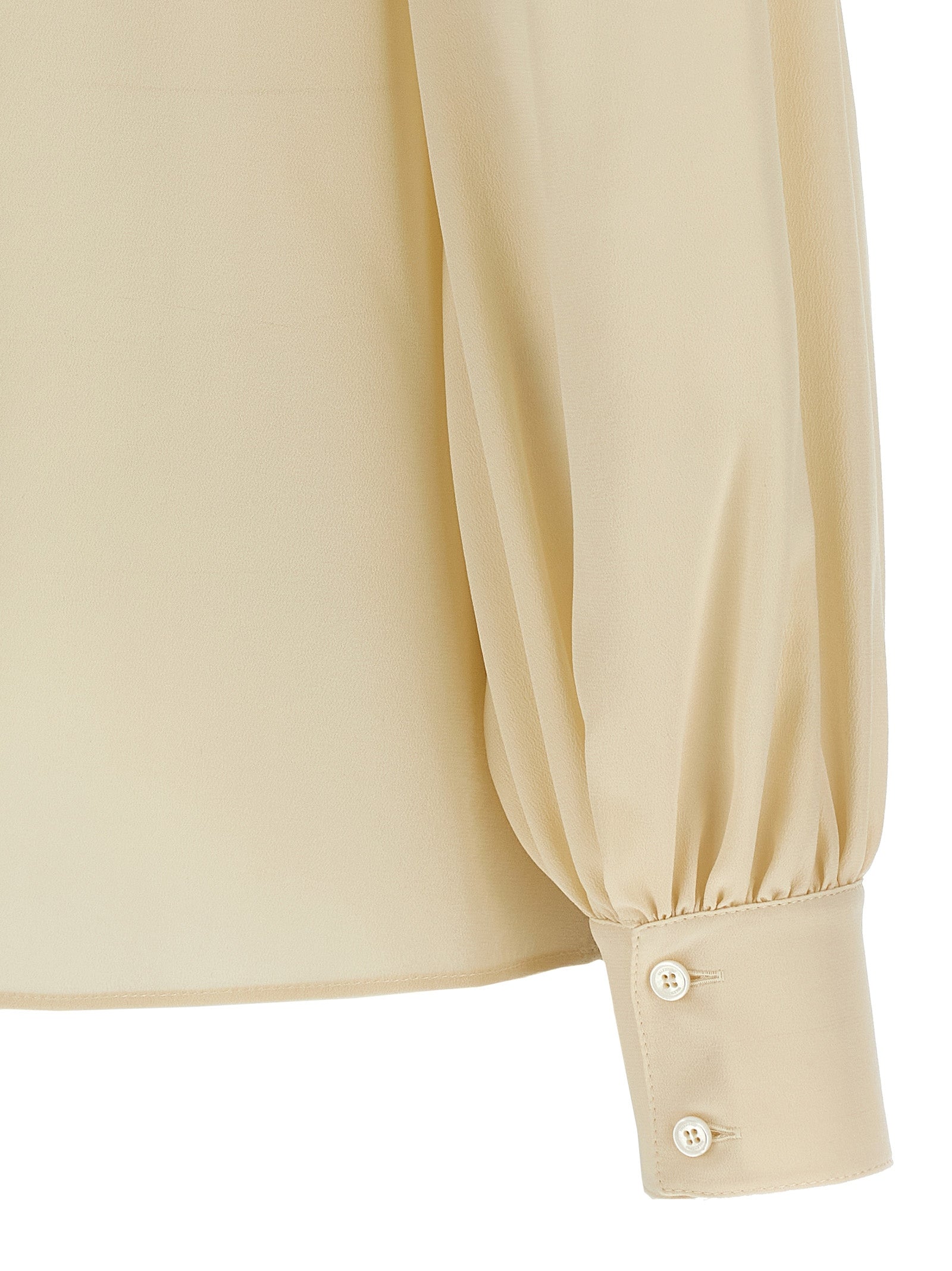 Blouse by Valentino Garavani for women in silk crepe beige showcases a sublime silhouette, artfully detailed with a sublime and for a sophisticated, sublime finish.