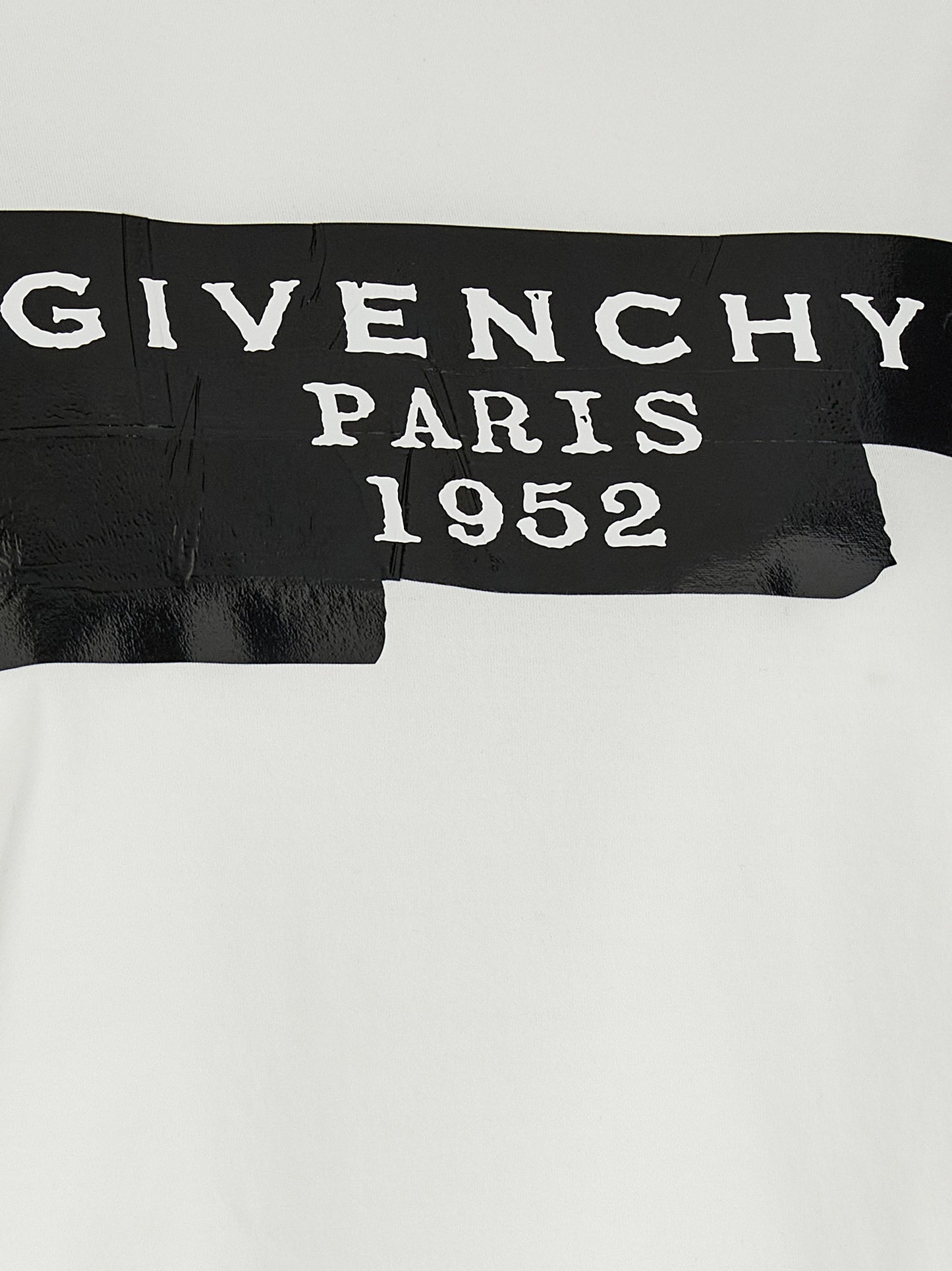 T-Shirt by Givenchy for women in cotton bicolour, black & white showcases a chic silhouette, artfully detailed with a chic crew neckline and for a chic finish.