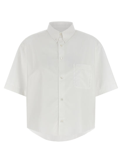 Blouse by Maison Margiela for women in cotton white, featuring a nuanced short-sleeve and nuanced asymmetric neckline for a sophisticated finish.