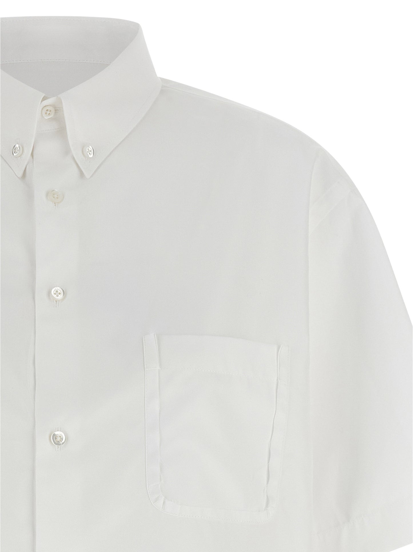 Blouse by Maison Margiela for women in cotton white features an architectural silhouette with a refined and elegant asymmetric neckline for a architectural look.