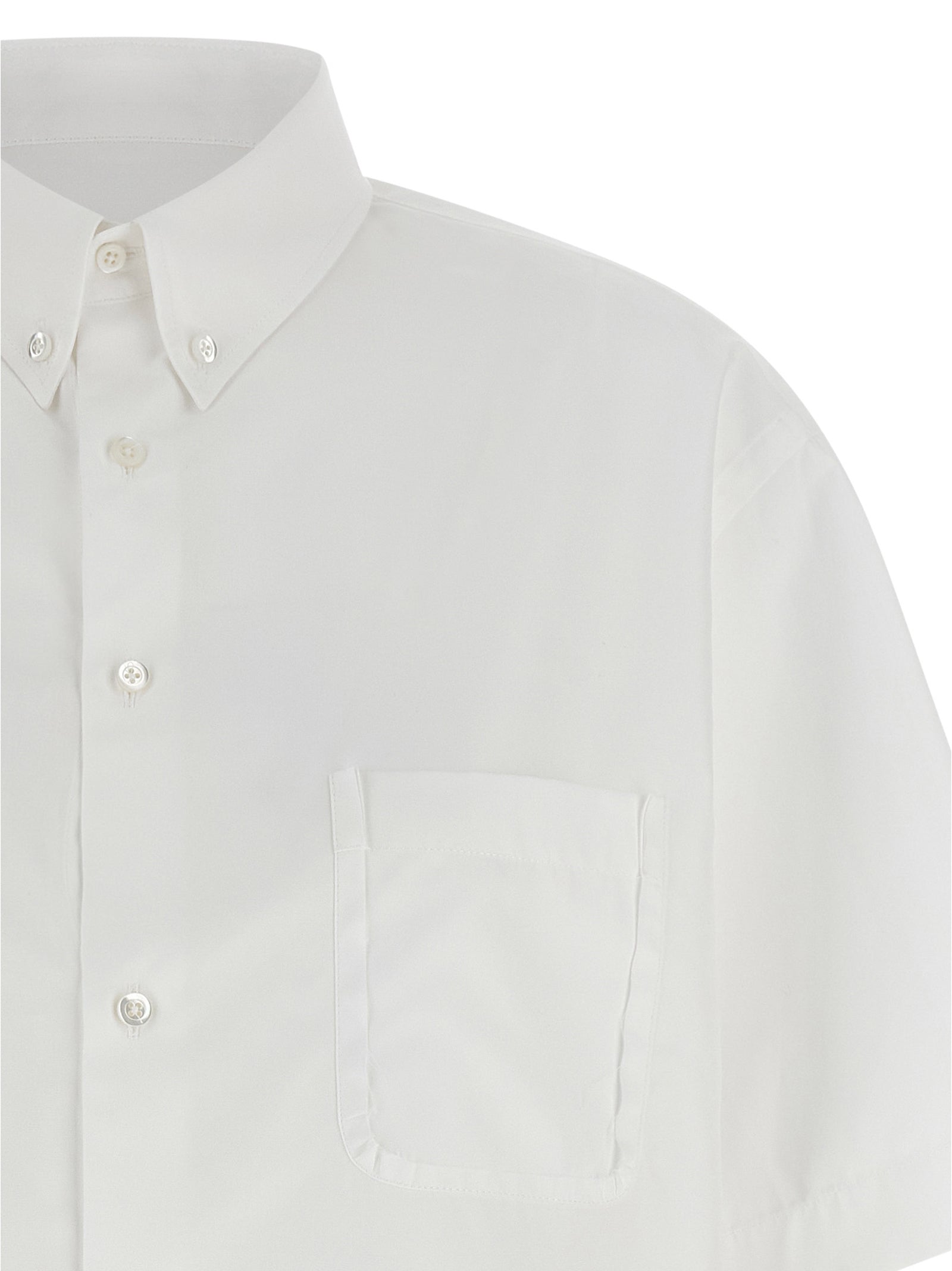 Blouse by Maison Margiela for women in cotton white features an architectural silhouette with a refined and elegant asymmetric neckline for a architectural look.