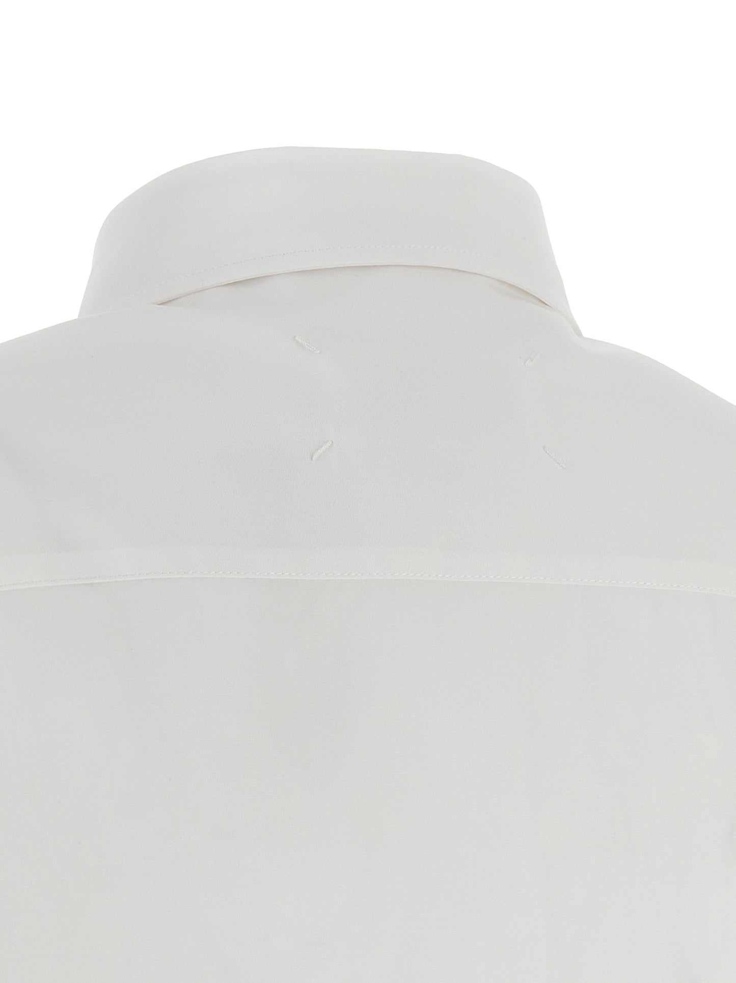 Blouse by Maison Margiela for women in cotton white showcases a sublime silhouette, artfully detailed with a sublime and for a sophisticated, sublime finish.