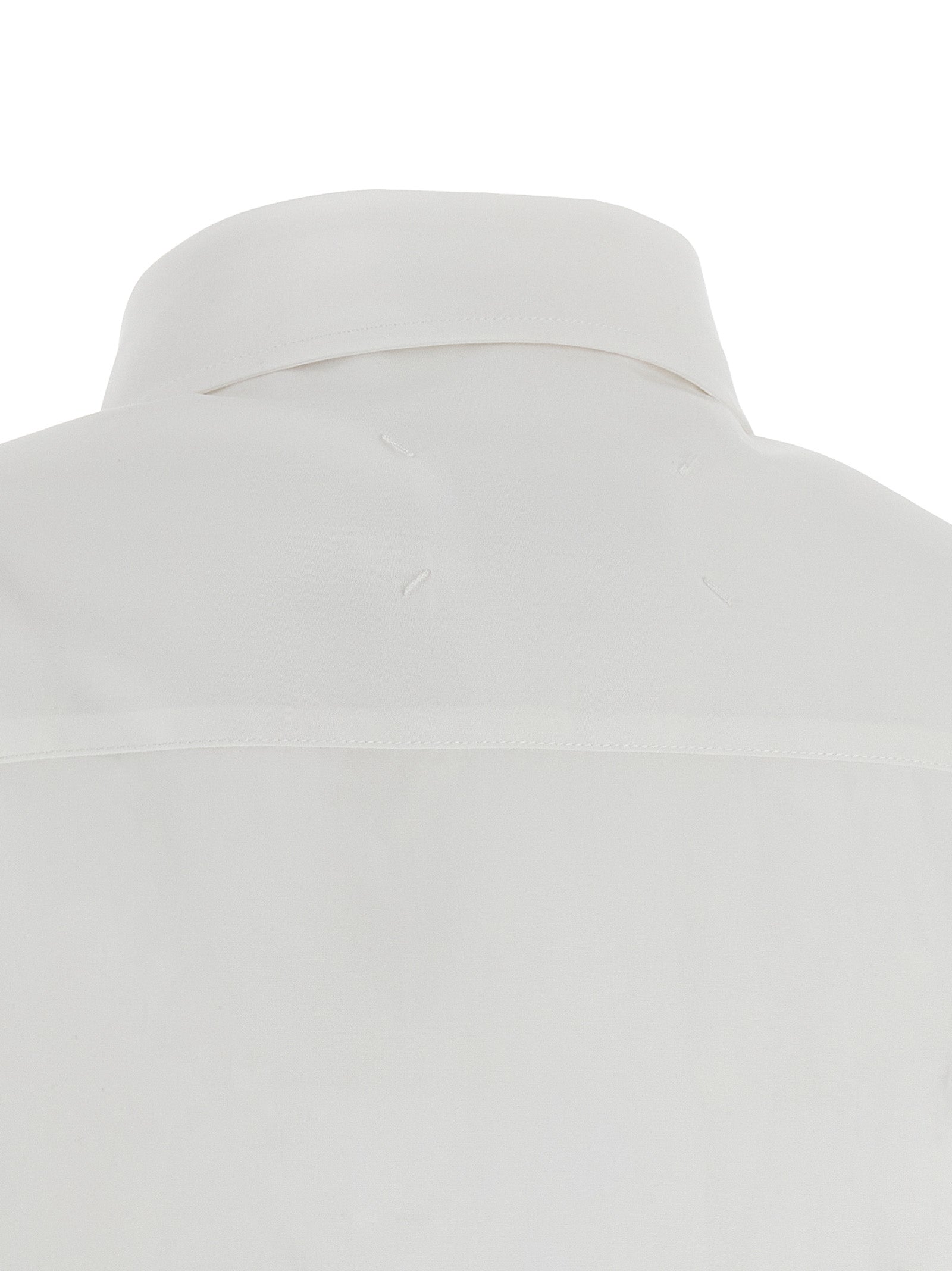 Blouse by Maison Margiela for women in cotton white showcases a sublime silhouette, artfully detailed with a sublime and for a sophisticated, sublime finish.