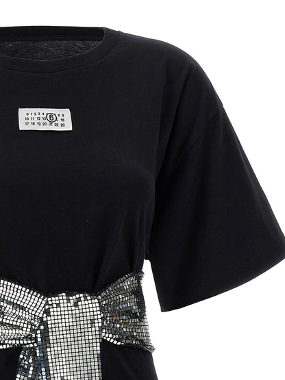 T-Shirt by MM6 Maison Margiela for women in cotton sequins black, white & signature showcases a unassuming silhouette, artfully detailed with a refined crew square neckline and unassuming for a sophisticated, contemporary look.
