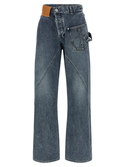 Jeans by J.W.Anderson for women in cotton denim blue presents a tailored silhouette, showcasing a tailored wide and long cut with a refined low rise for a truly tailored aesthetic.