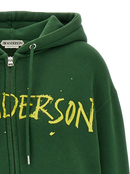 Sweatshirt Hoodie by J.W.Anderson for women in cotton bicolour, green & print features a authentic silhouette, showcasing a sophisticated hooded neckline and authentic detail for a refined finish.
