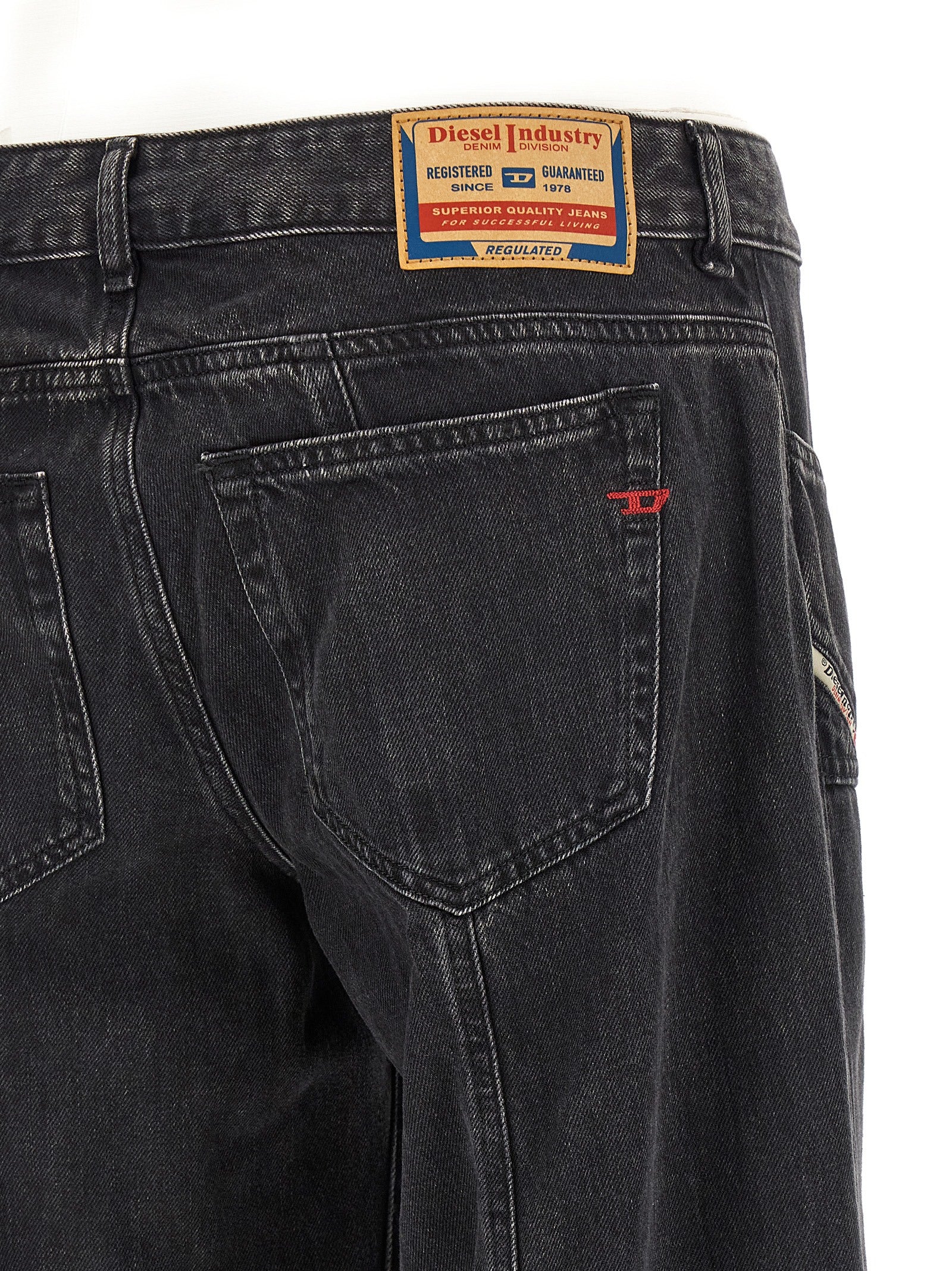 Jeans by Diesel for women in lyocell & denim cotton black features a polished silhouette with a polished wide, reaching a polished long and finished with a polished mid rise.