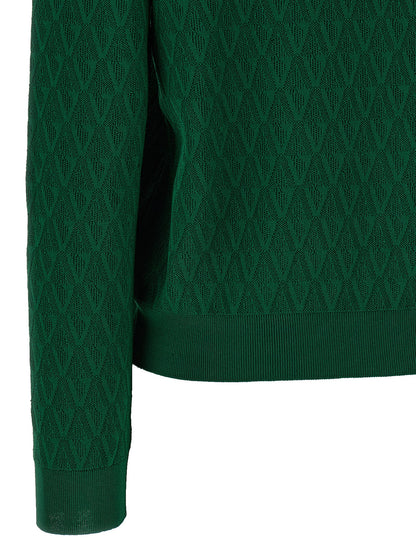 Cardigan by Versace for women in viscose & nylon bicolour, green, patterned & jacquard presents a textural silhouette, artfully finished with a textural and for a sophisticated, textural look.