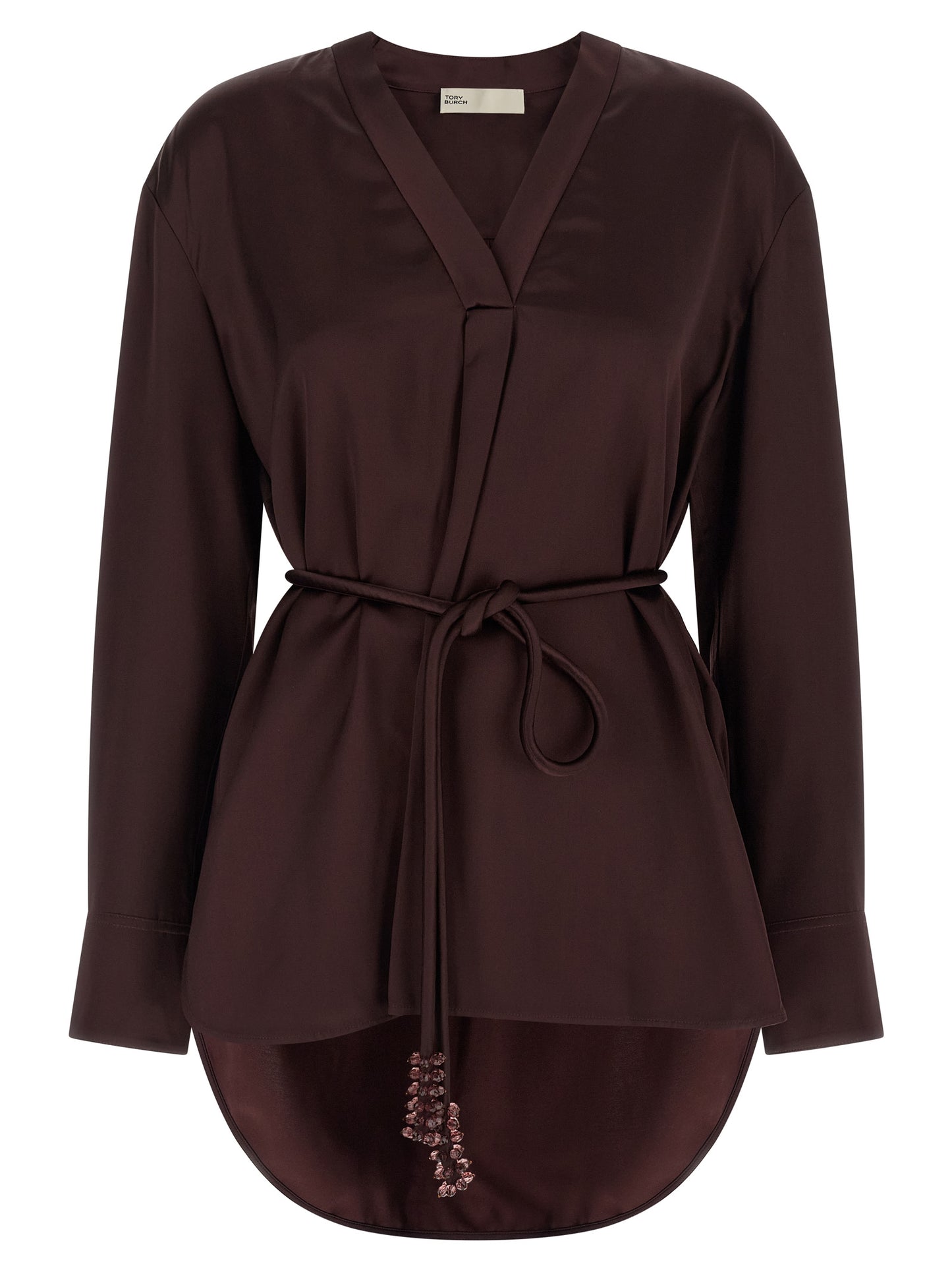 Blouse by Tory Burch for women in satin viscose bordeaux showcases a sublime silhouette, artfully detailed with a sublime v-neck asymmetric neckline and long-sleeve for a sophisticated, sublime finish.