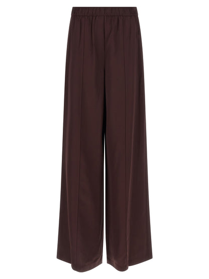 Trousers by Tory Burch for women in viscose bordeaux features a sculptural silhouette, showcasing a sculptural straight-leg and long with a sophisticated for a sculptural finish.