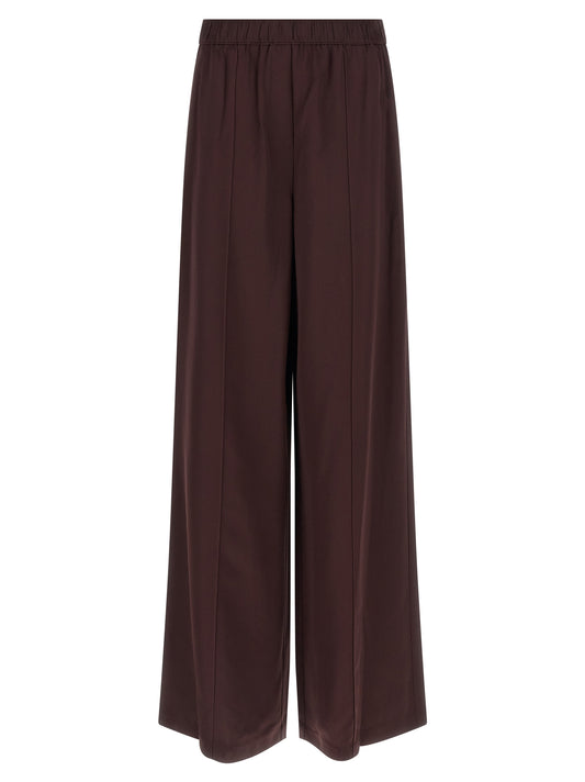 Trousers by Tory Burch for women in viscose bordeaux features a sculptural silhouette, showcasing a sculptural straight-leg and long with a sophisticated for a sculptural finish.
