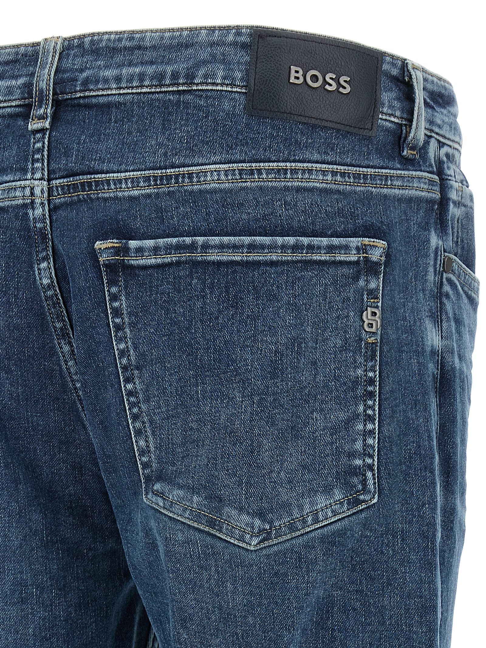 Jeans by Hugo Boss for men in stretch denim cotton blue features an sartorial skinny and long with a cut for a sartorial finish.