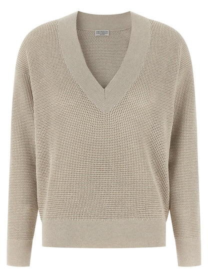 Cardigan by Brunello Cucinelli for women in viscose cotton beige & patterned showcases a captivating silhouette, artfully detailed with a captivating and v-neck neckline for a truly sophisticated captivating look.