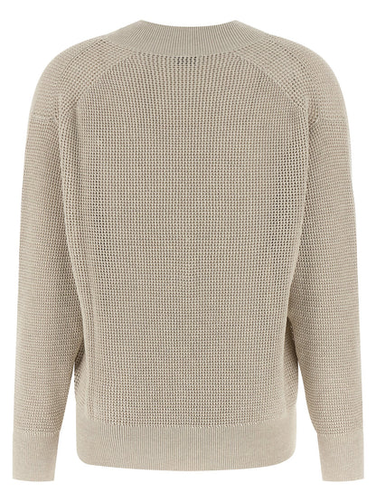 Cardigan by Brunello Cucinelli for women in viscose cotton beige & patterned features a nuanced silhouette with a refined v-neck neckline and nuanced detailing for a sophisticated look.