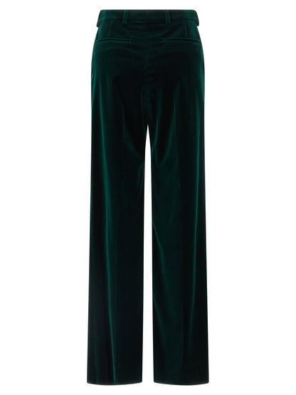 Trousers by Gucci for women in velvet cotton bicolour & green features a tailored silhouette with a tailored straight-leg & flared, defined by its long and a sophisticated .