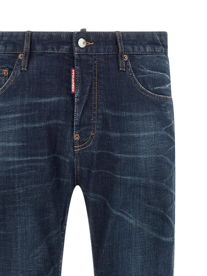 Jeans by Dsquared² for men in stretch denim cotton blue & signature presents a refined pantology silhouette, artfully defined by a refined pantology straight-leg, long, and a sophisticated .