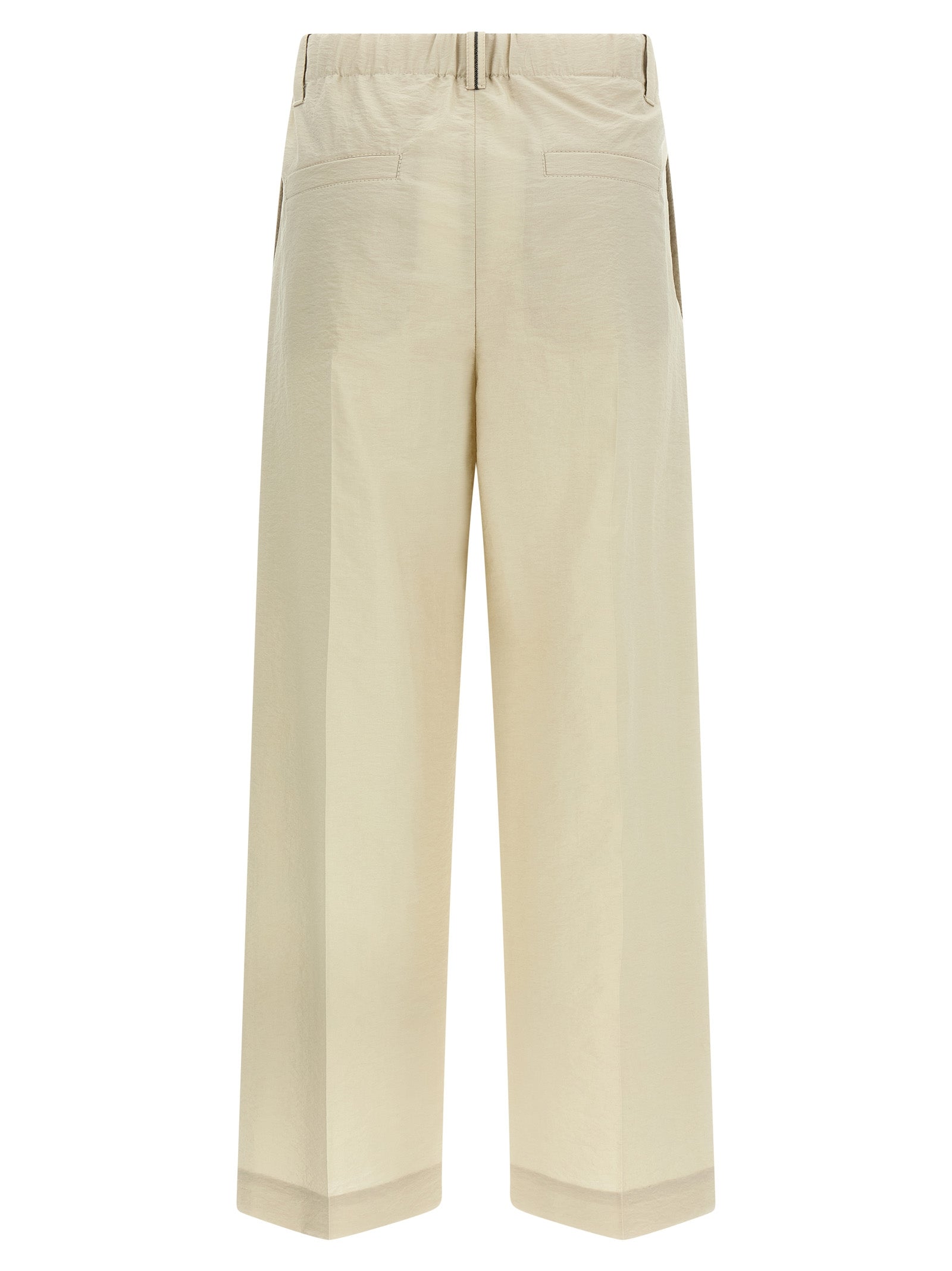 Trousers by Brunello Cucinelli for women in polyamide cotton white presents a smart silhouette, meticulously detailed with a smart , a smart long, and a smart mid rise.