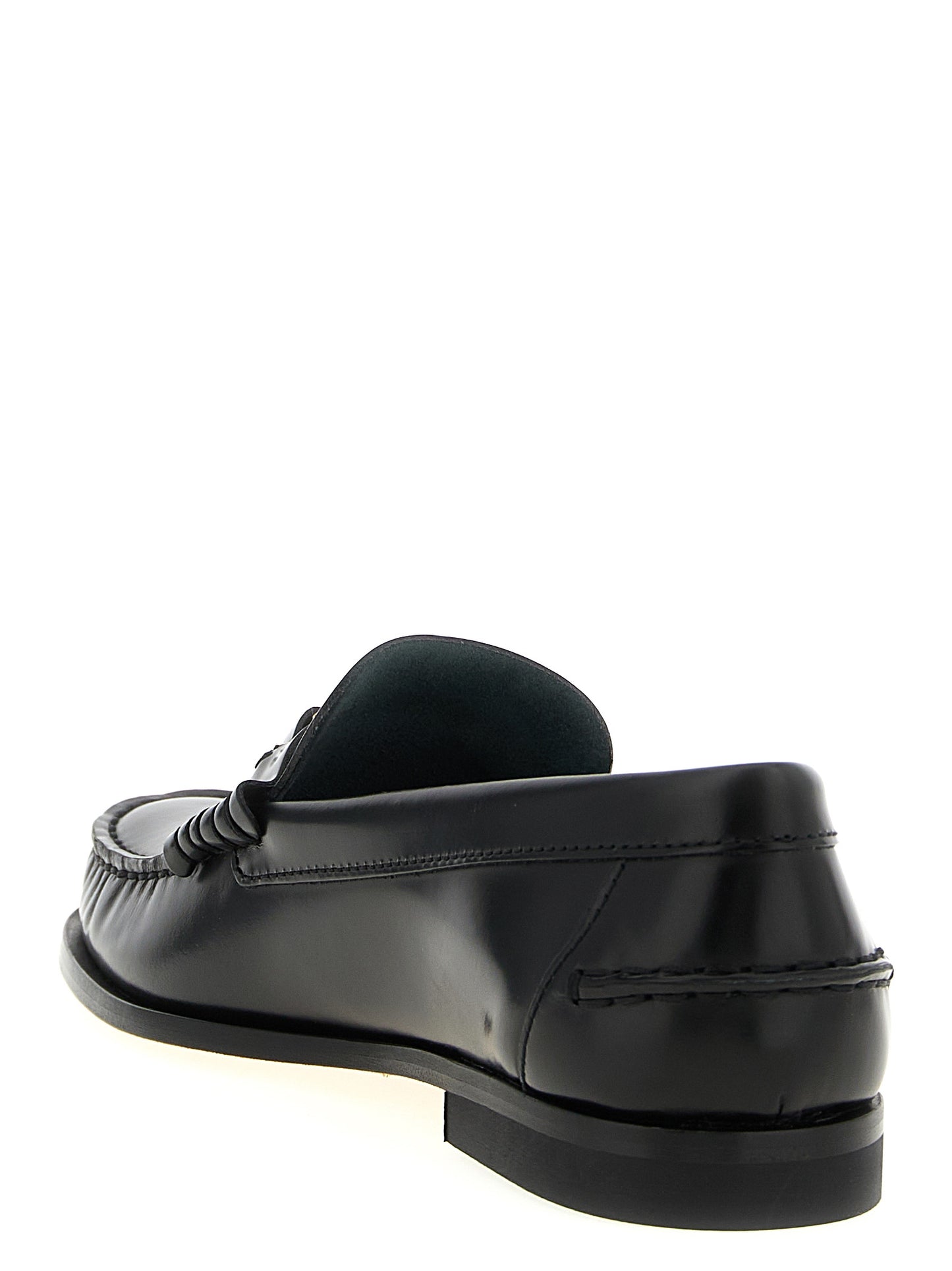 Flat Loafer Slip-On Shoes by Tod's for women in calfskin leather black & gold features an dynamic silhouette from the T Timeless Women's Calfskin Leather Flat Loafer Slip-On Shoes collection, defined by a dynamic and flat for a dynamic look.