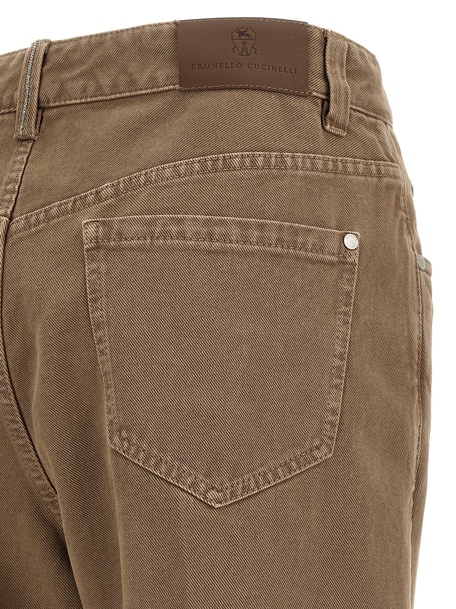 Jeans by Brunello Cucinelli for women in denim cotton beige presents a refined pantology silhouette, artfully defined by a refined pantology straight-leg, long, and a sophisticated .
