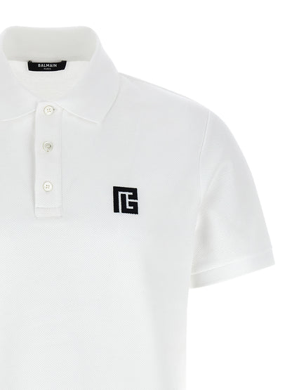 Polo Shirt by Balmain for men in cotton bicolour, black & white presents a distinguished silhouette, showcasing a sophisticated and distinguished for a truly distinguished finish.