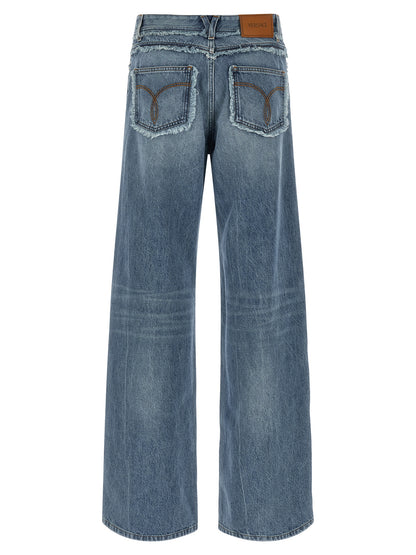Jeans by Versace for women in cotton denim blue & signature features a refined silhouette with a refined relaxed-fit, wide & boyfriend, defined by a low rise and a refined long for a refined finish.