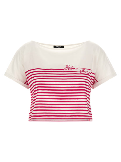 T-Shirt by Balmain for women in cotton fuchsia showcases a dramatic silhouette, elegantly detailed with a dramatic boat neckline and for a truly dramatic finish.
