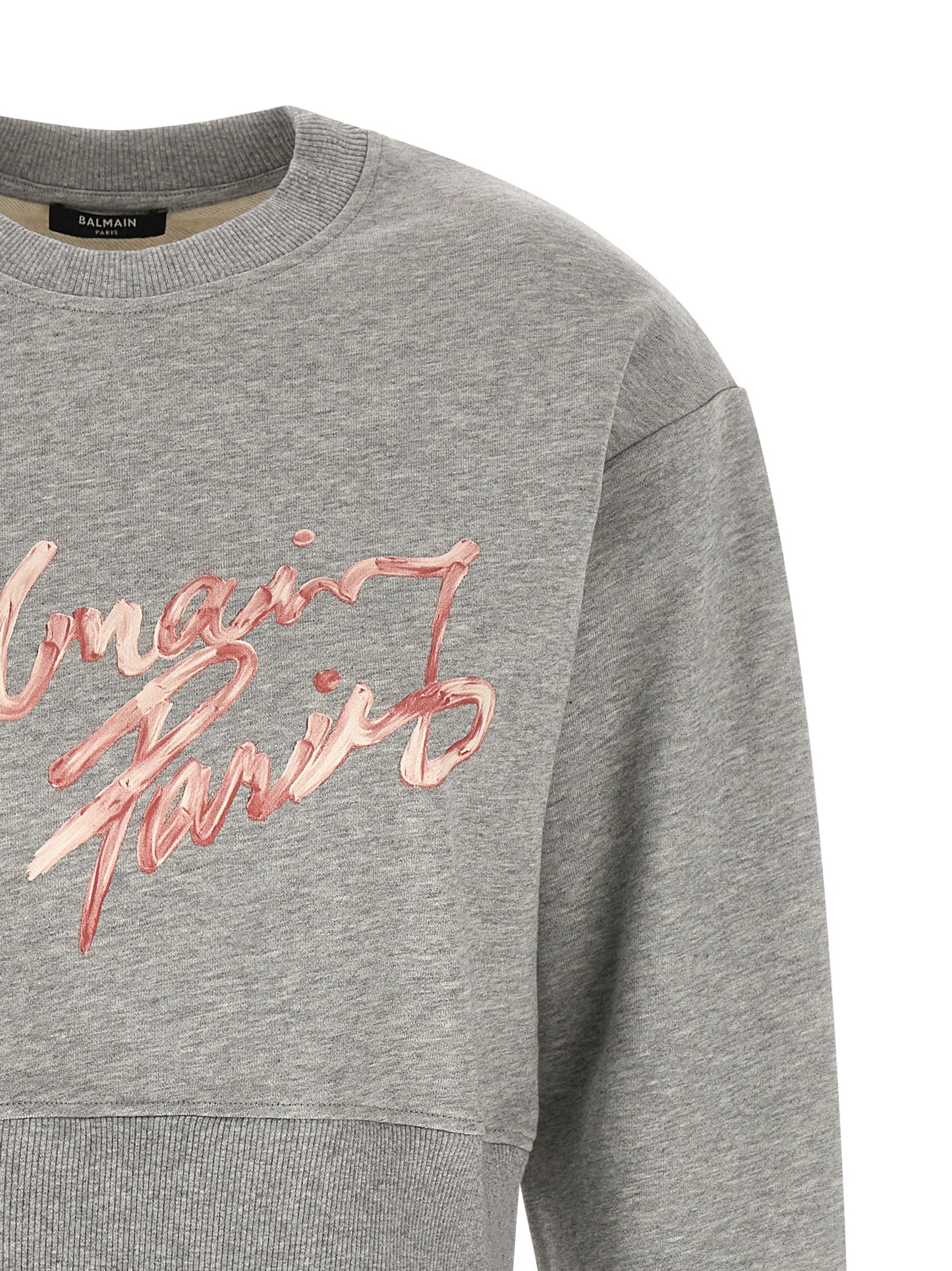 Activewear Sweatshirt by Balmain for women in cotton gray & print presents a dynamic silhouette, featuring a dynamic crew neckline and detailed with functional .