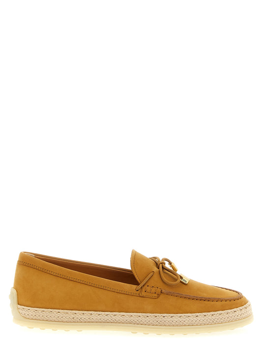 Flat Loafer Slip-On Shoes by Tod's for women in raffia & suede calfskin leather beige showcases a resplendent Women's Raffia & Suede Calfskin Leather Flat Loafer Slip-On Shoes aesthetic, defined by its resplendent and elegant flat.