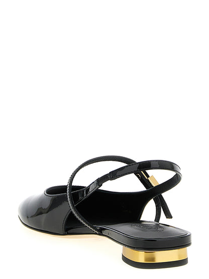 Ballet Mary-Jane Flat Shoes by Tod's for women in patent calfskin leather black presents a effortless chic silhouette, showcasing the Women's Patent Calfskin Leather Ballet Mary-Jane Flat Shoes design with a effortless chic and for a sophisticated look.
