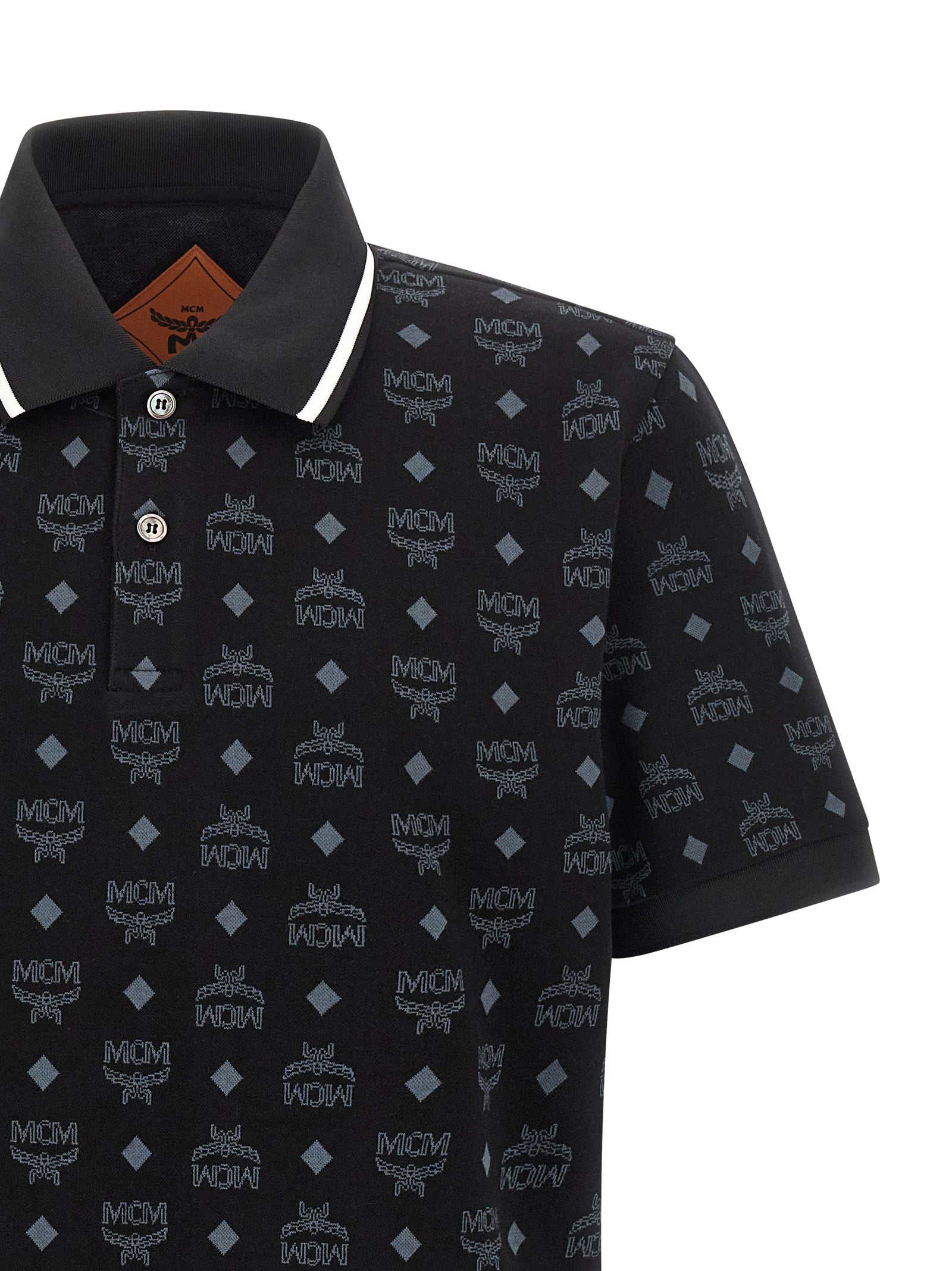Polo Shirt by MCM for men in cotton black & jacquard presents a sleek silhouette, featuring a refined asymmetric neckline and for a sleek finish.