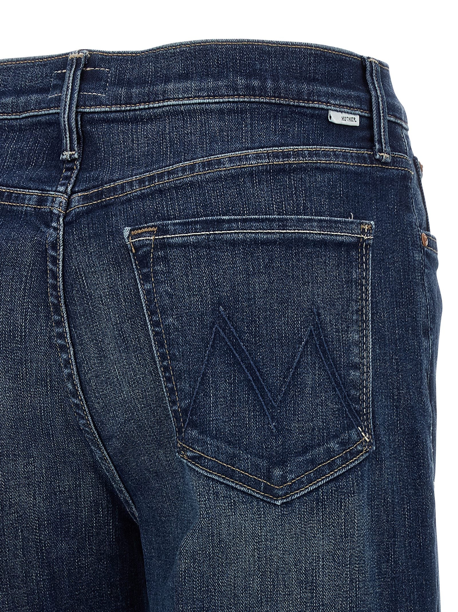 Jeans by Mother Denim for women in stretch denim cotton blue features a polished silhouette with a polished straight-leg, reaching a polished long and finished with a polished .