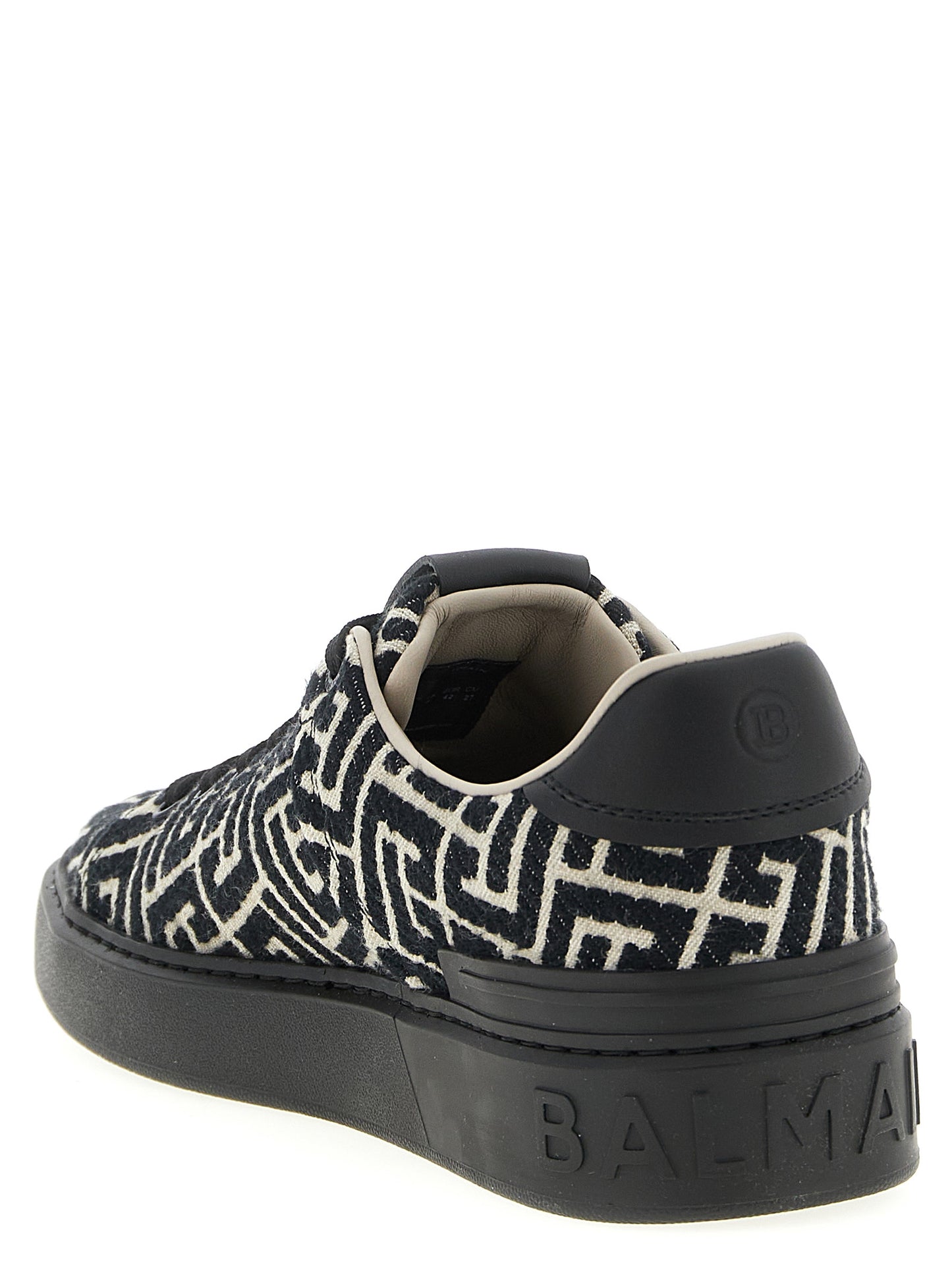 Sneakers by Balmain for men in cotton polyester black, patterned, jacquard & monogram presents a impeccable silhouette as Men's Fashion Cotton Polyester Sneakers, expertly defined by a impeccable fashion style for a impeccable, high-fashion look.
