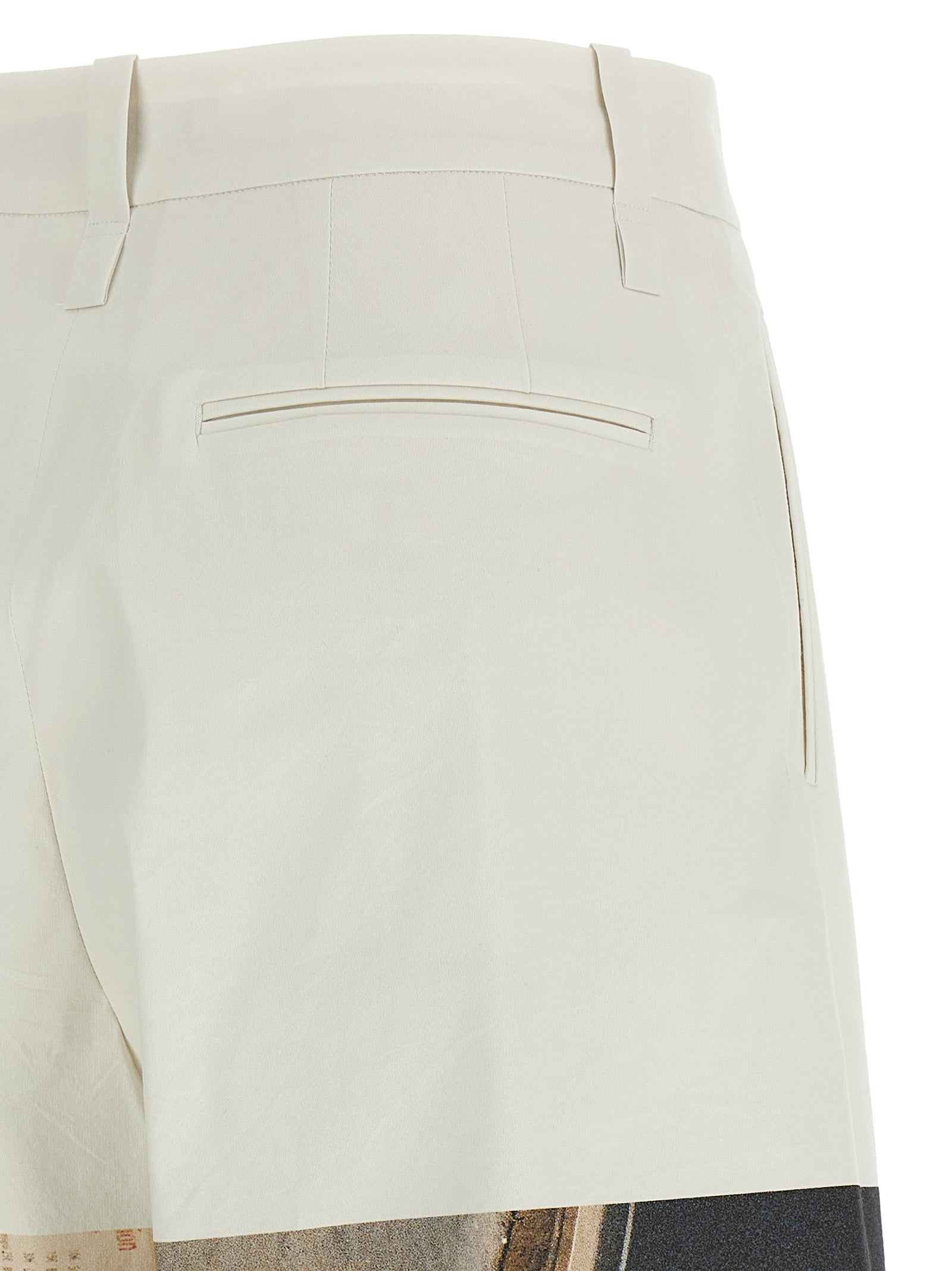 Casual Pants by Issey Miyake for women in polyamide polyurethane & cotton white & print presents a tailored silhouette, showcasing a tailored wide and long cut with a refined for a truly tailored aesthetic.