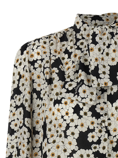 Blouse by Valentino Garavani for women in silk crepe bicolour, black, white & patterned presents a discerning silhouette, showcasing a sophisticated and for a truly discerning finish.