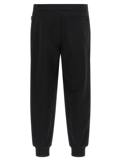Joggers by Hugo Boss for men in cotton black & striped presents a refined pantology silhouette, artfully defined by a refined pantology , long, and a sophisticated .
